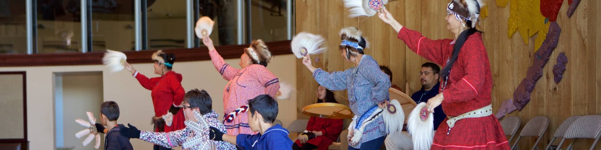 Alaska Native Heritage Center featuring performance art and interior views