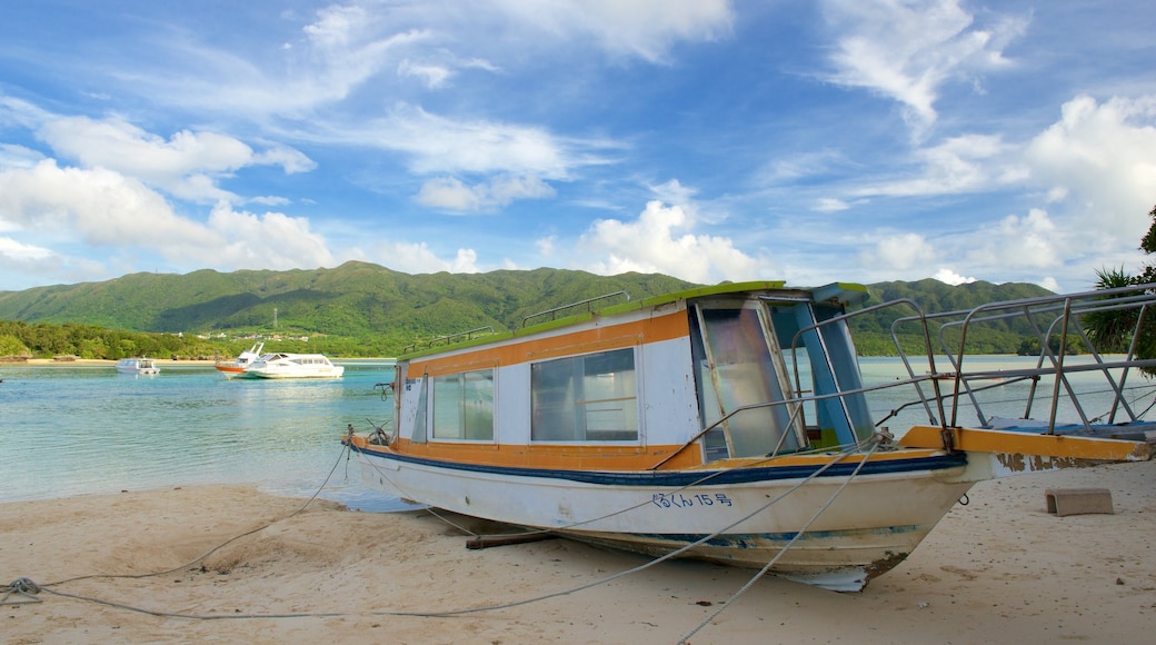 Kabira Bay Beach showing a sandy beach and boating