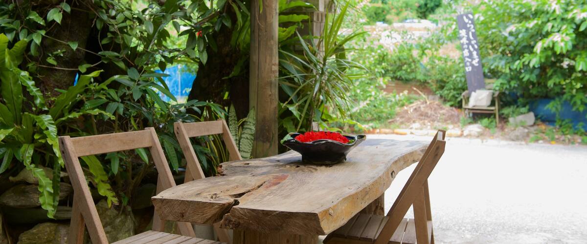 Okinawa which includes a small town or village and cafe scenes