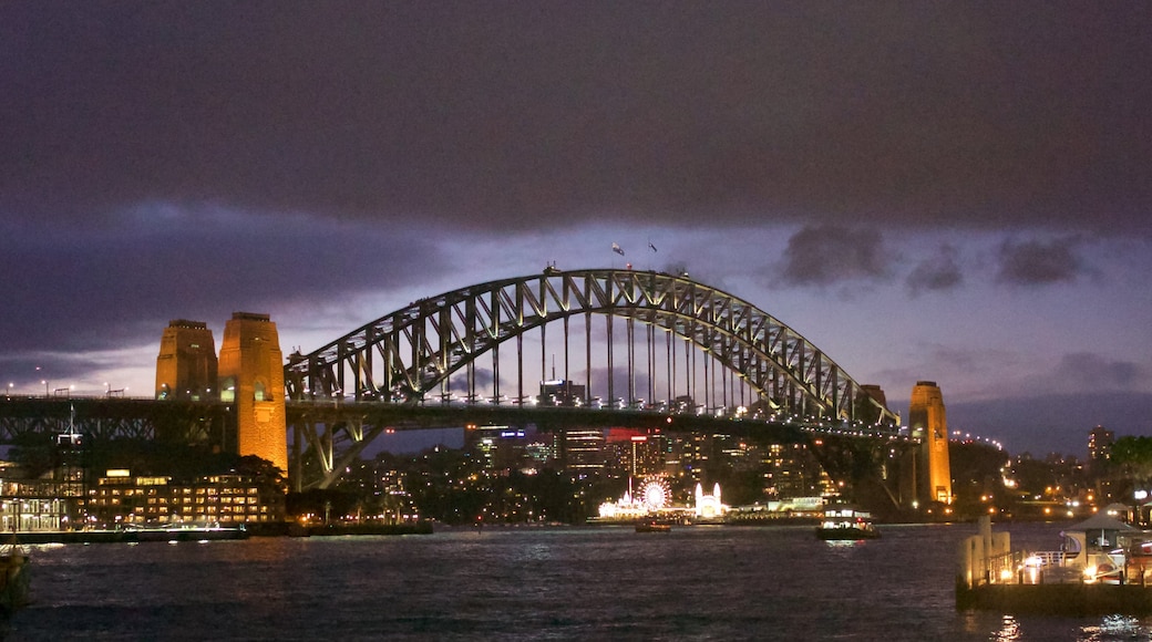 Sydney Harbour Bridge which includes boating, a city and general coastal views
