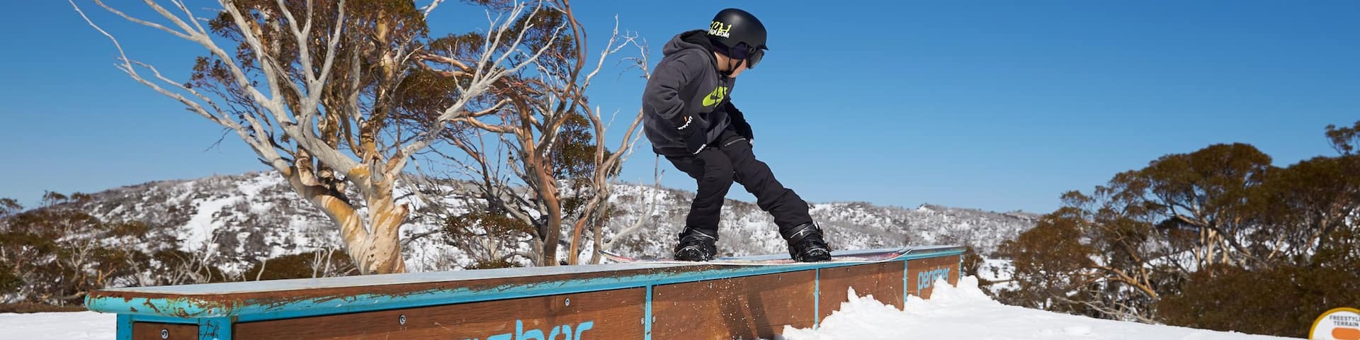 Perisher Ski Resort featuring snowboarding and snow