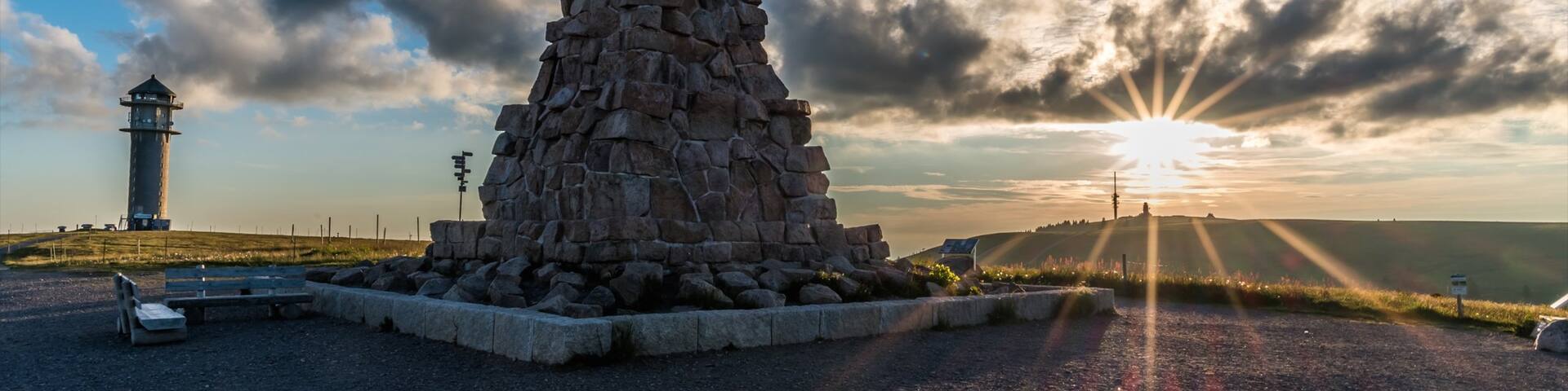 Feldberg Ski Resort featuring a sunset and a monument