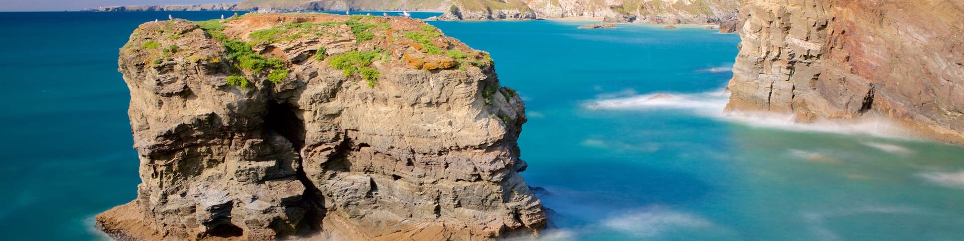 Porth Beach das einen allgemeine Küstenansicht und Landschaften