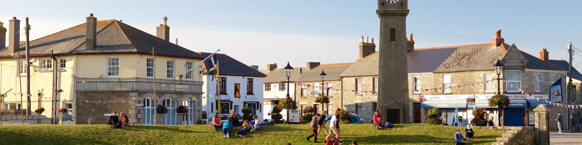 St Just featuring a coastal town, heritage architecture and a garden