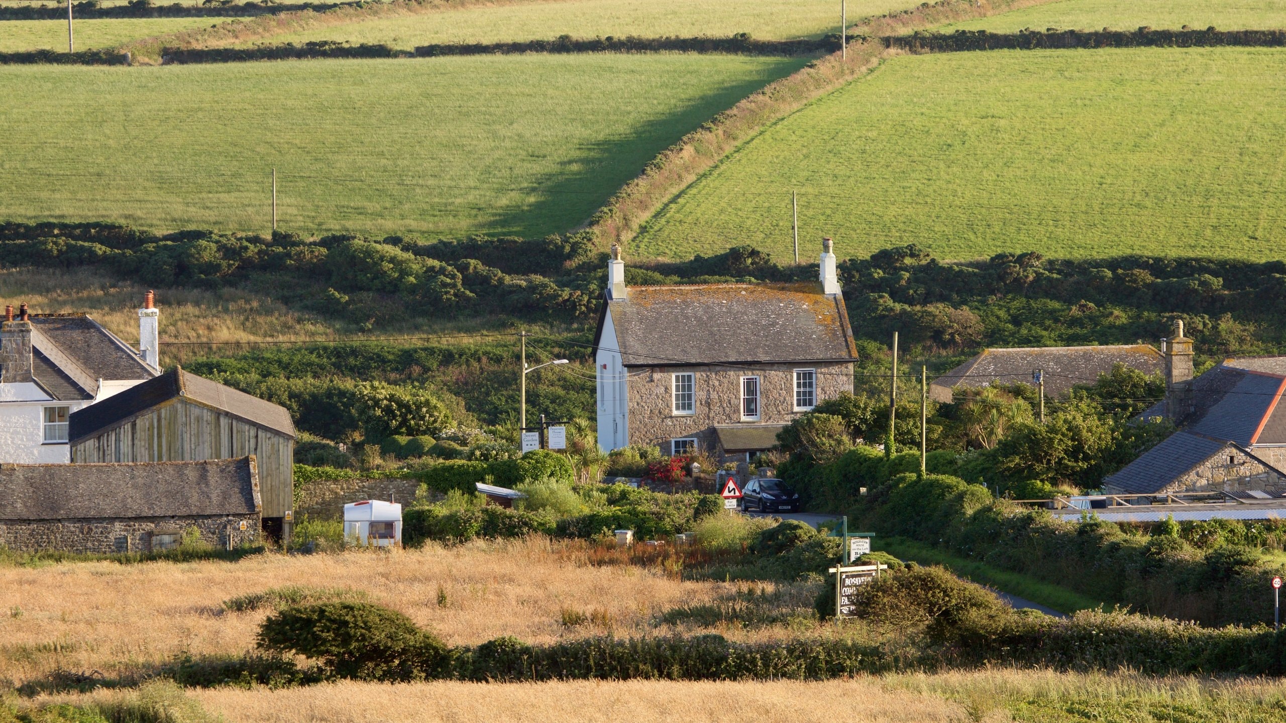 Cornwall showing farmland and a house