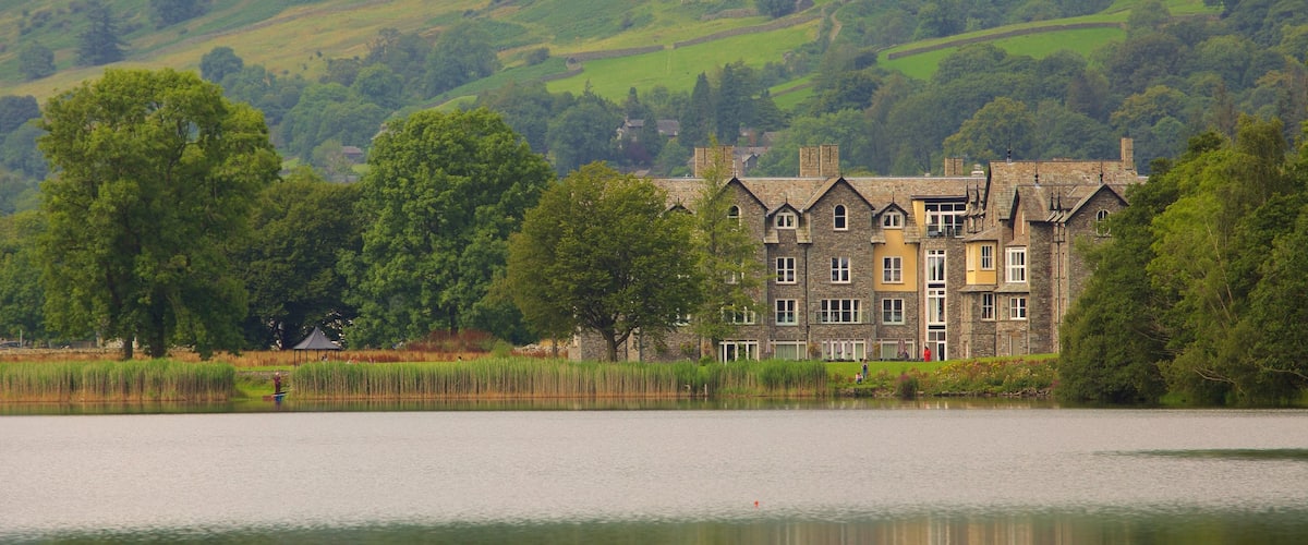 Grasmere which includes tranquil scenes, a lake or waterhole and château or palace