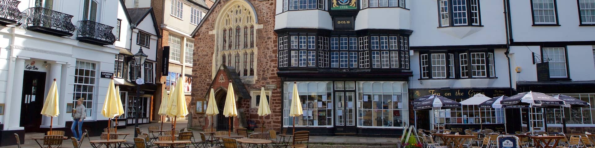 Exeter featuring heritage architecture, a small town or village and café scenes