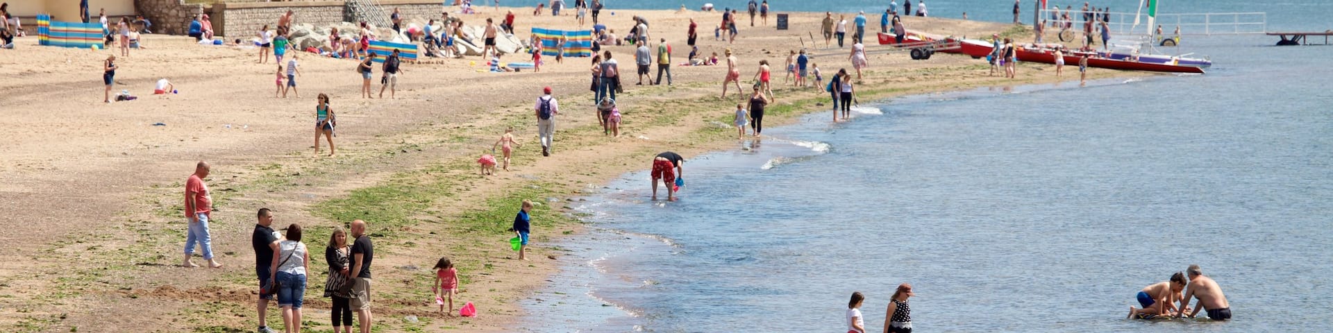 Exmouth mostrando località costiera, nuoto e spiaggia
