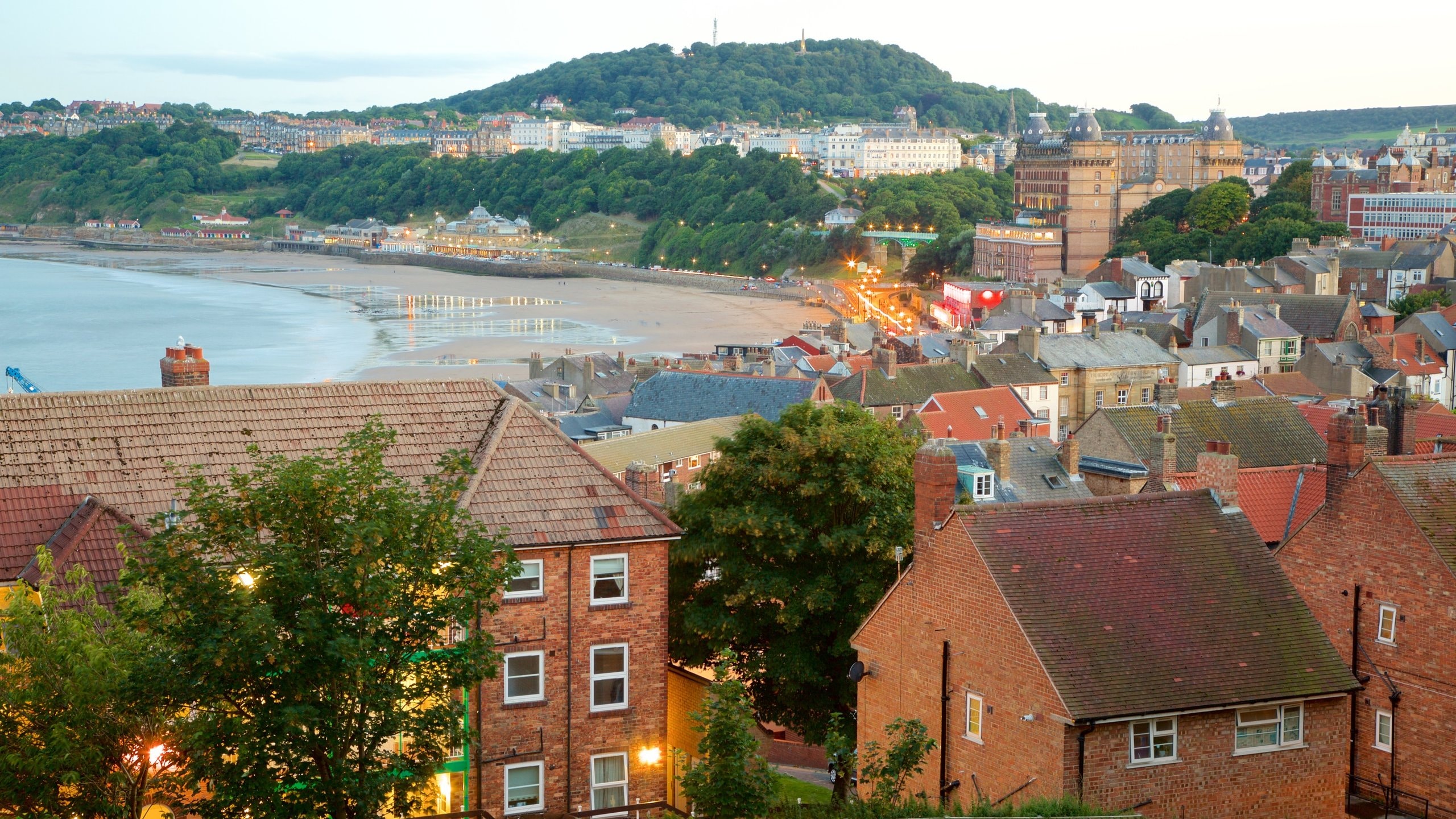 Scarborough featuring general coastal views, a sandy beach and a coastal town