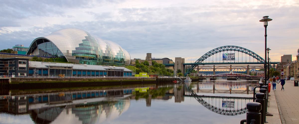 Quayside featuring a river or creek, a bridge and modern architecture