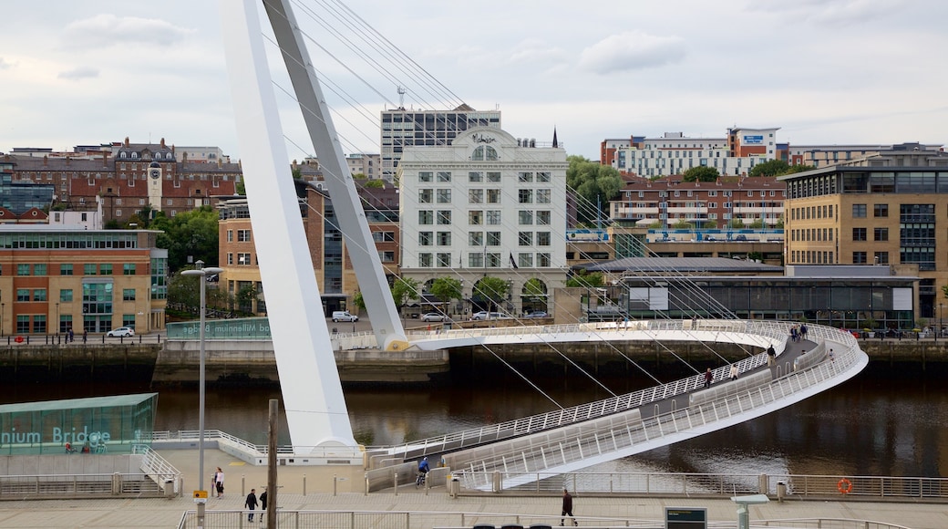 Gateshead Millennium Bridge featuring a city, modern architecture and a river or creek