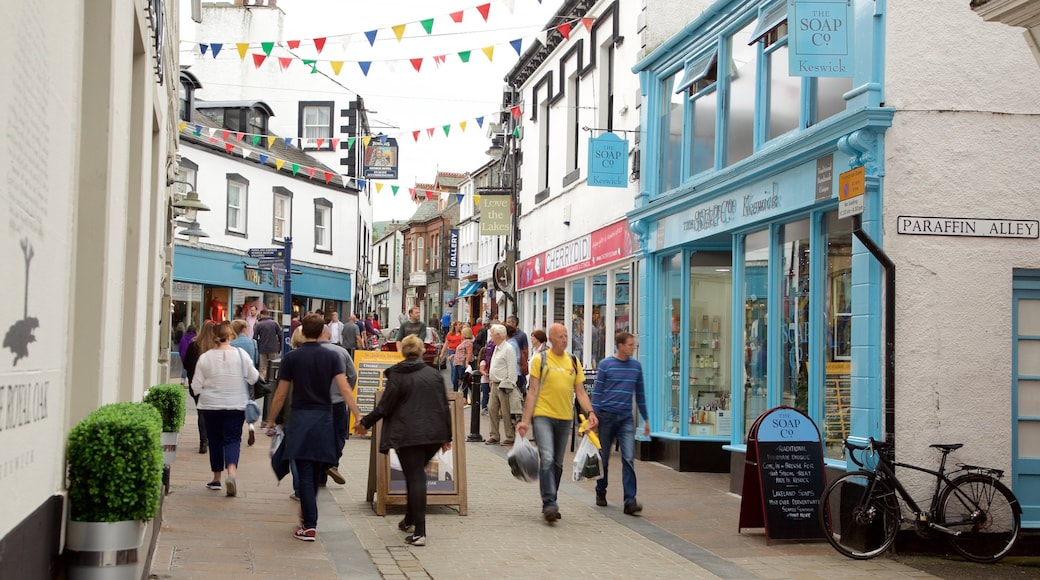 Keswick which includes signage, street scenes and café lifestyle