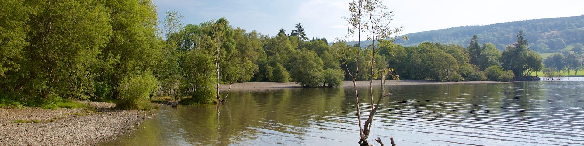 Coniston Water featuring a lake or waterhole and a pebble beach