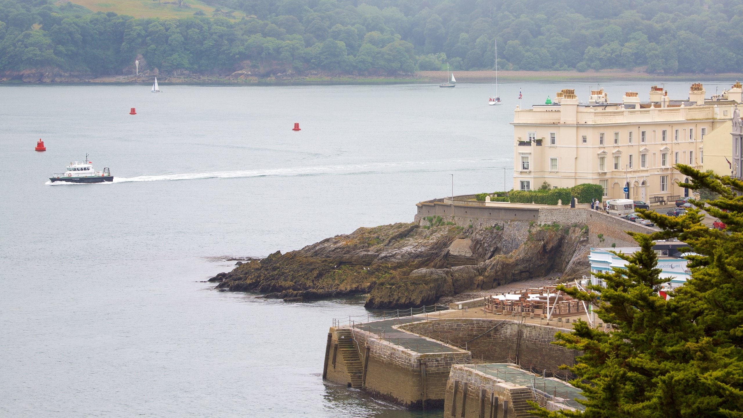 Plymouth which includes boating, a coastal town and general coastal views