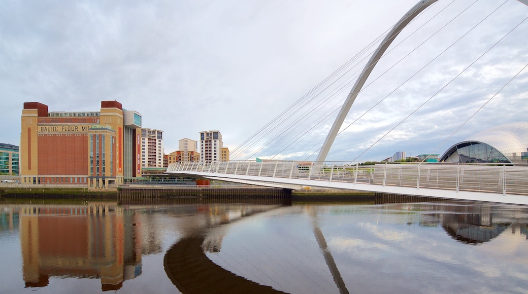 Gateshead Millennium Bridge featuring a river or creek, modern architecture and a bridge