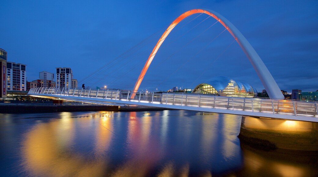 Gateshead Millennium Bridge which includes modern architecture, a bridge and night scenes