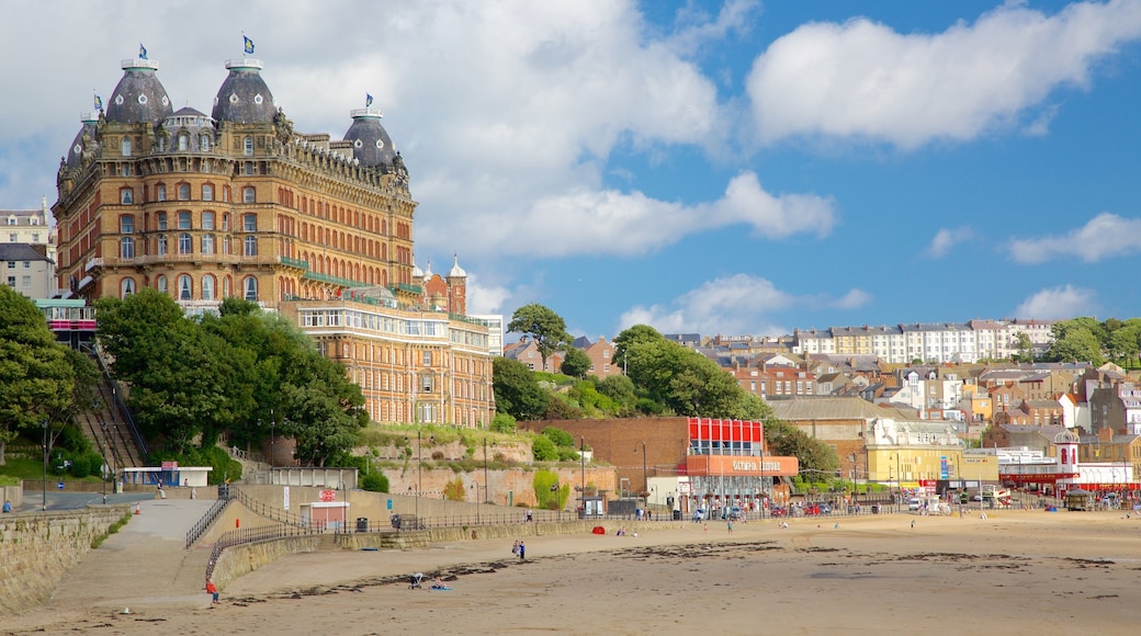 South Bay Beach showing a hotel, heritage architecture and a coastal town