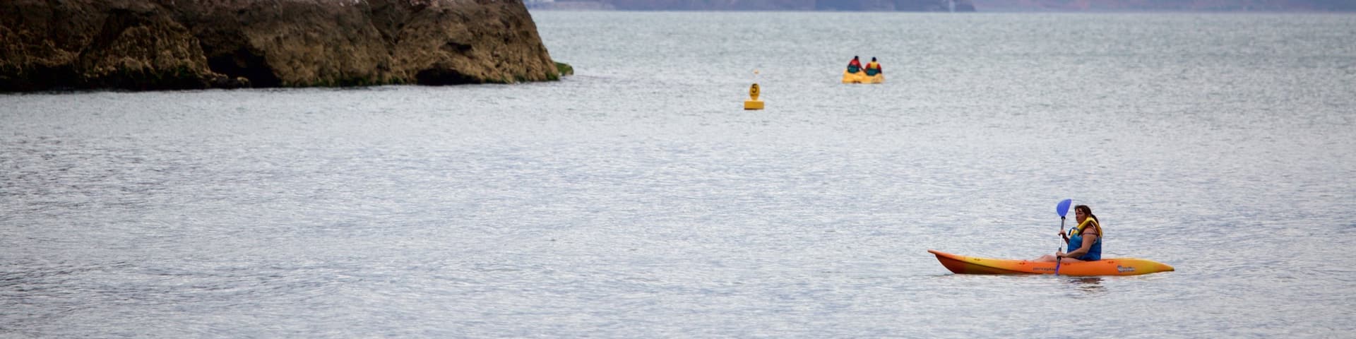 Babbacombe Beach showing kayaking or canoeing and general coastal views