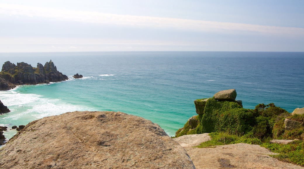 Logan\'s Rock which includes a sandy beach and landscape views