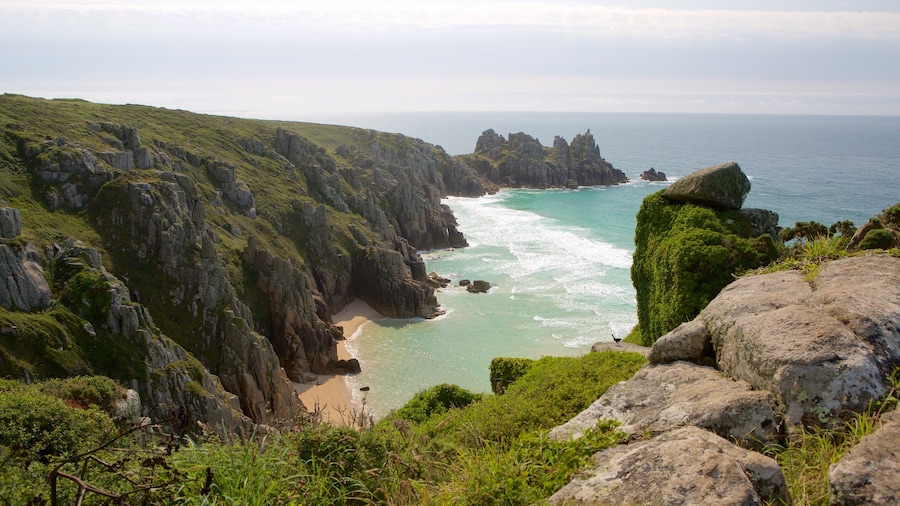 Logan\'s Rock which includes a sandy beach and landscape views