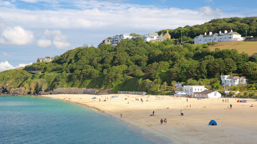 Porthminster Beach featuring a beach and a coastal town