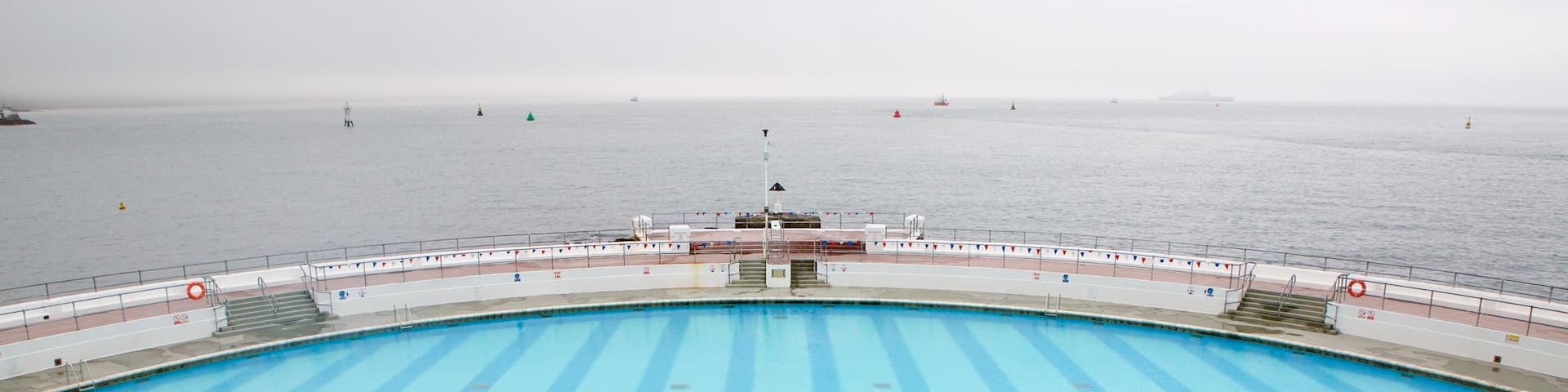 Plymouth showing general coastal views and a pool