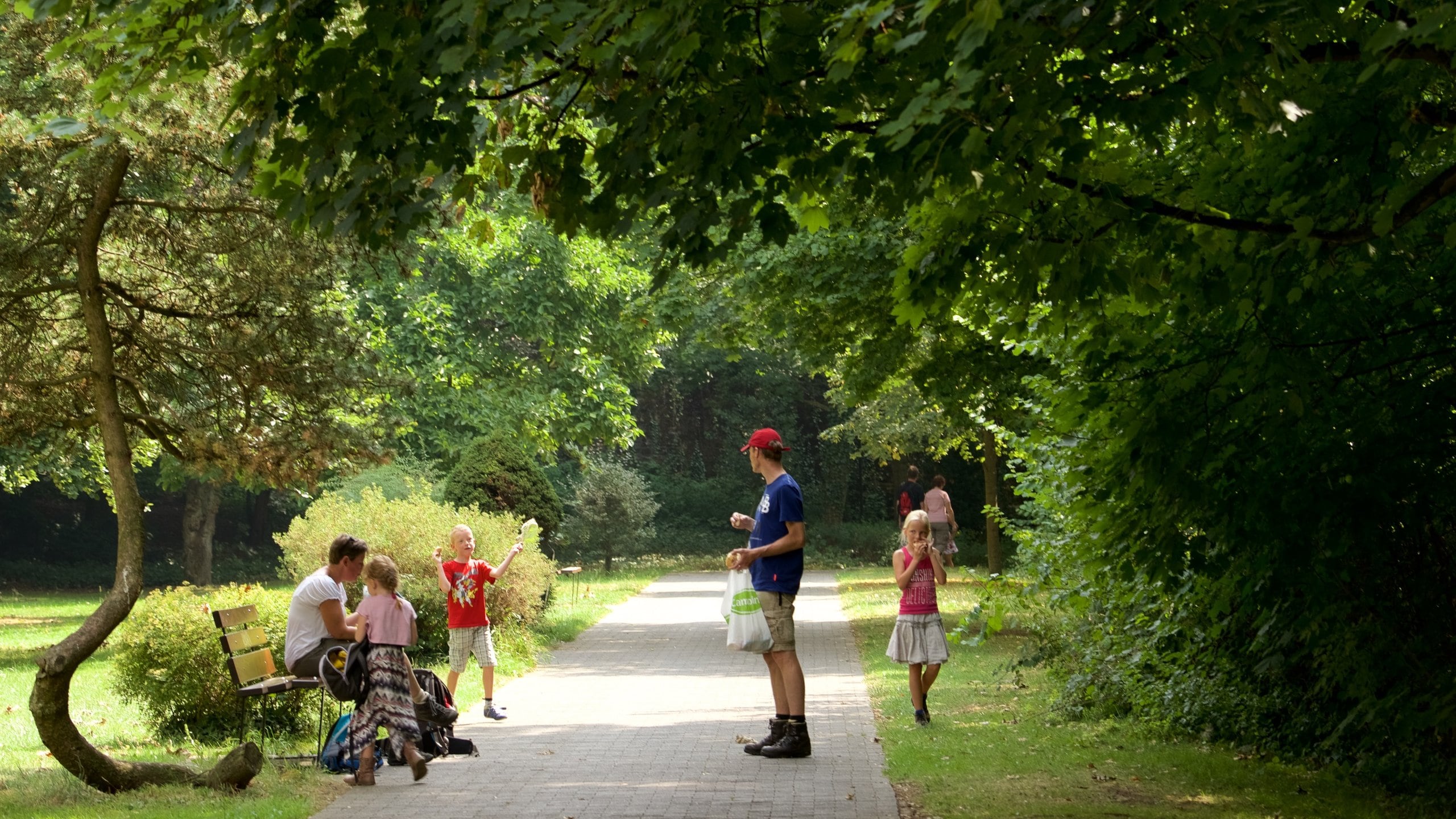 Luxembourg featuring a park as well as a small group of people