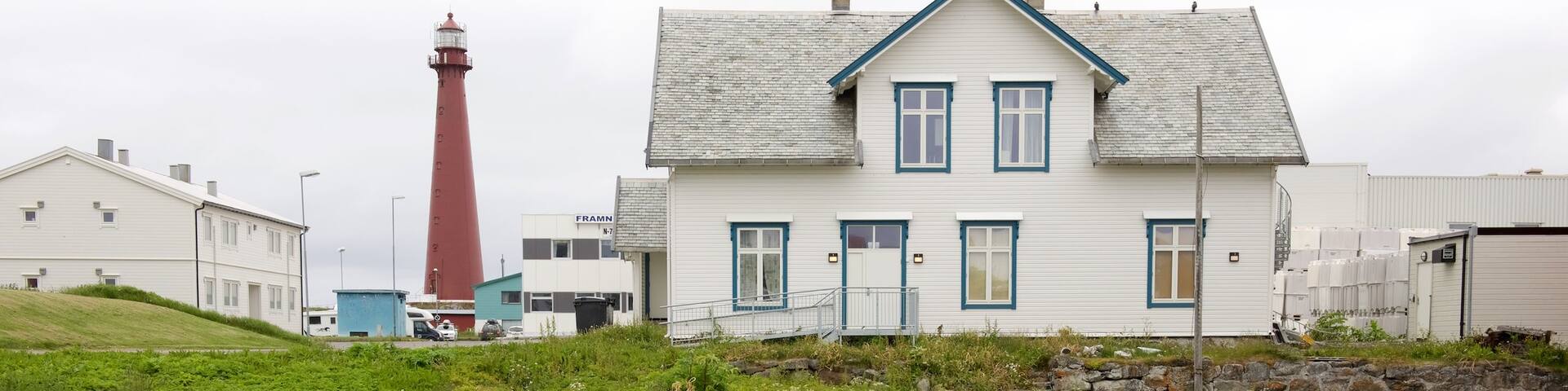 Andenes featuring a house and a lighthouse