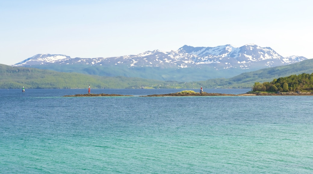 Finnsnes which includes general coastal views and mountains