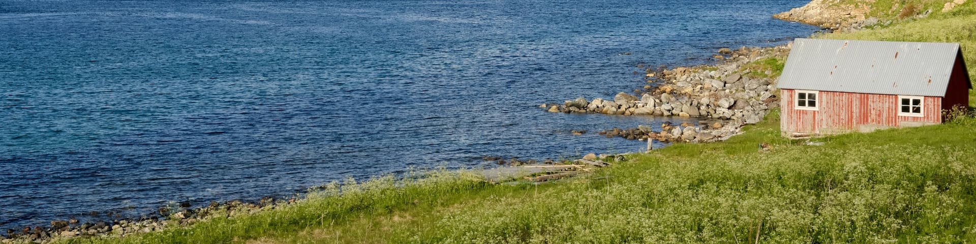 Kvalsund featuring a lake or waterhole and a house