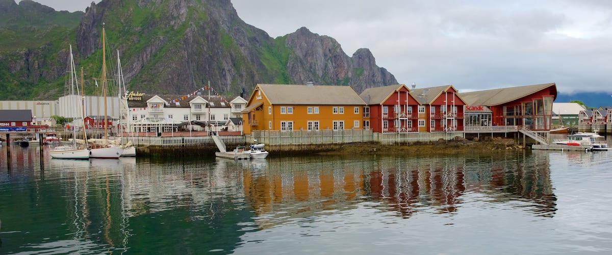 Northern Norway featuring a small town or village, mountains and boating