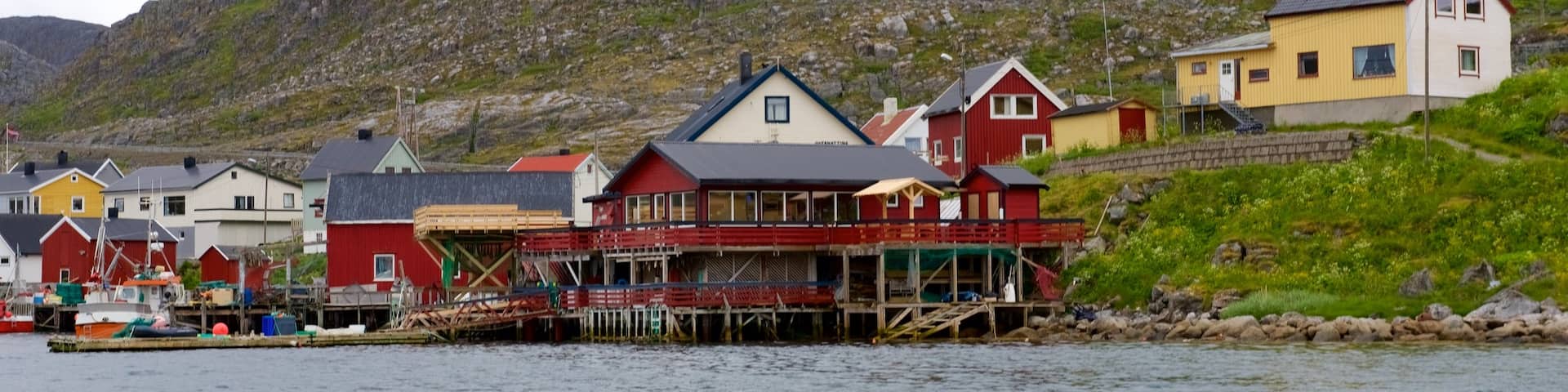 Nordkapp featuring mountains and a small town or village