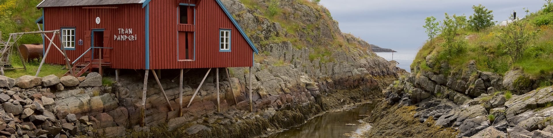 Norwegian Fishing Village Museum showing a river or creek