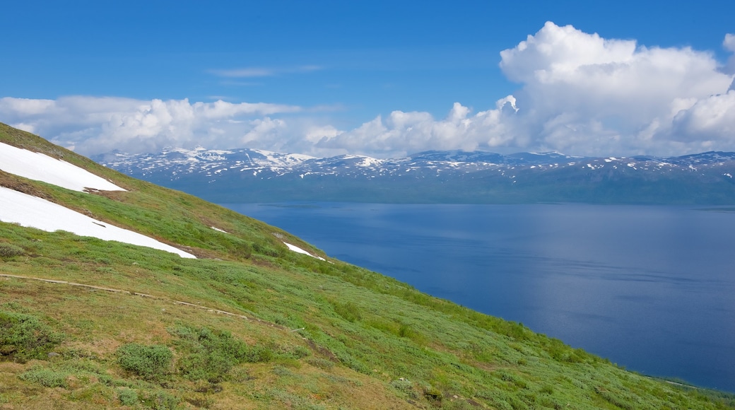 Abisko which includes a lake or waterhole and landscape views