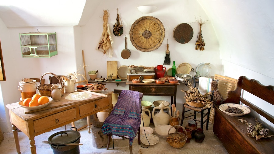 Trullo Sovrano featuring interior views and food