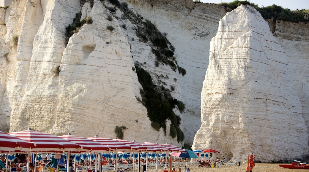 Pizzomuou which includes rugged coastline and a beach