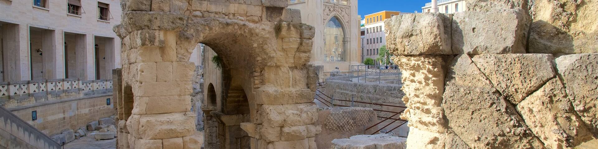 Roman Amphitheater which includes heritage architecture and a ruin