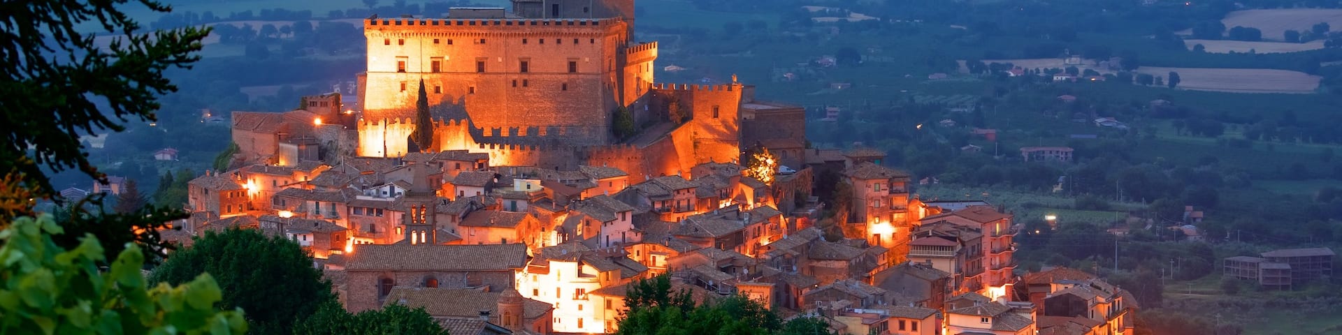 Soriano nel Cimino featuring night scenes, a city and heritage architecture