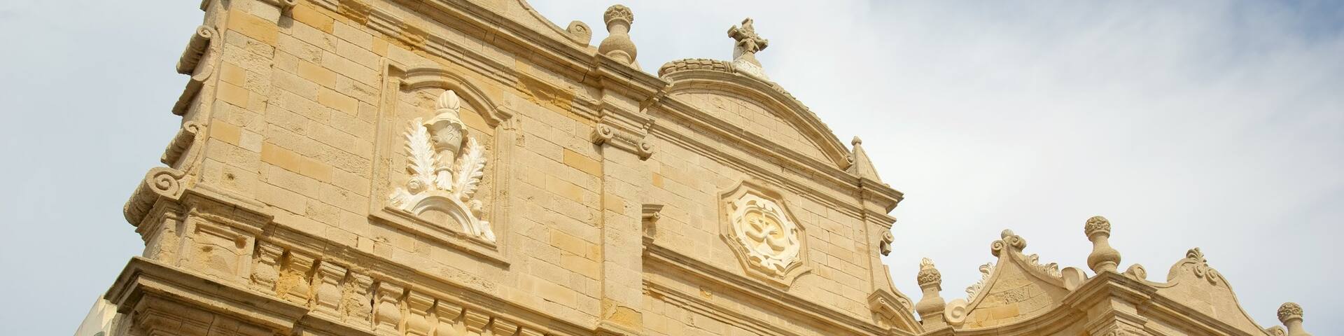 Church of St. Francis of Assisi featuring a church or cathedral, religious elements and heritage architecture