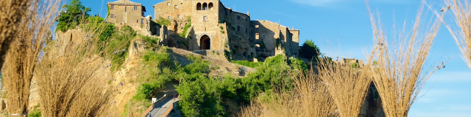 Bagnoregio showing a sunset, heritage architecture and a bridge