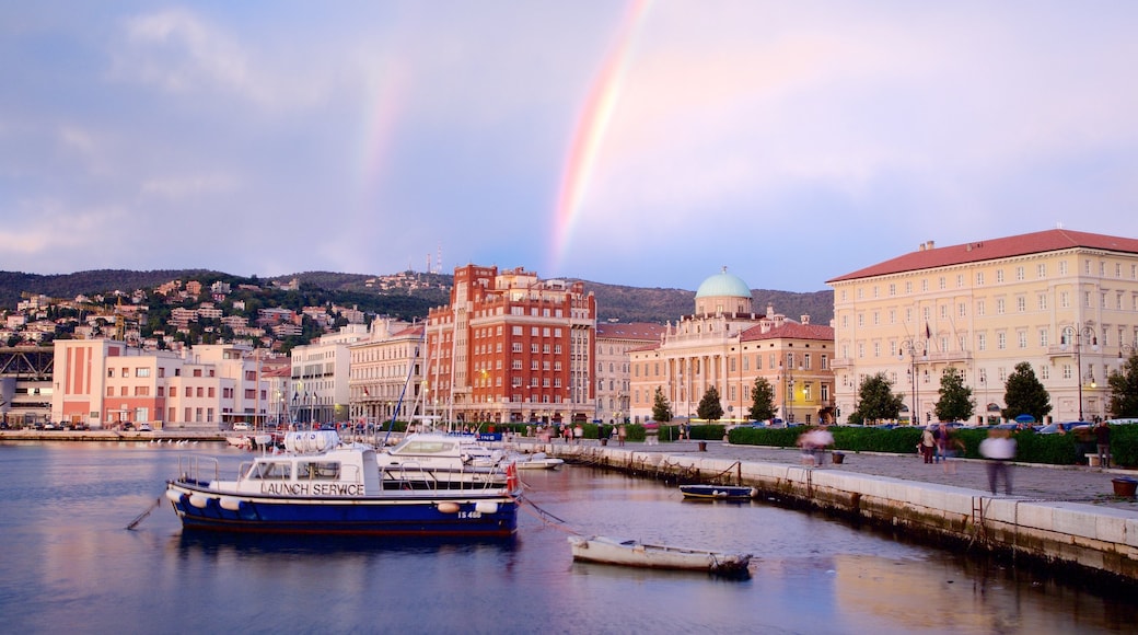 Trieste which includes heritage architecture, general coastal views and a sunset