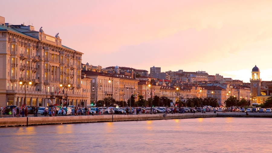 Trieste showing a sunset, heritage architecture and general coastal views