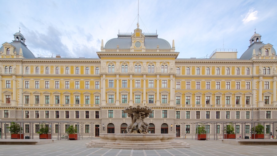Trieste featuring a fountain, an administrative building and heritage architecture