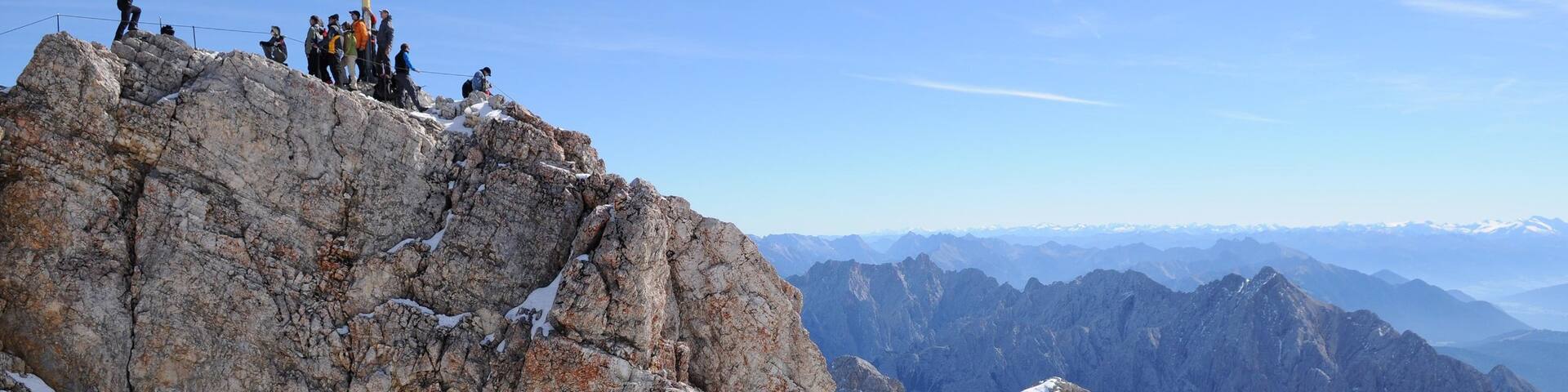 Zugspitze which includes mountains as well as a large group of people