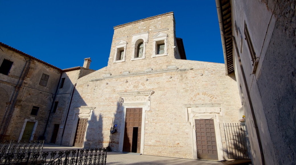 Basilica of San Salvatore which includes heritage architecture, a church or cathedral and religious aspects