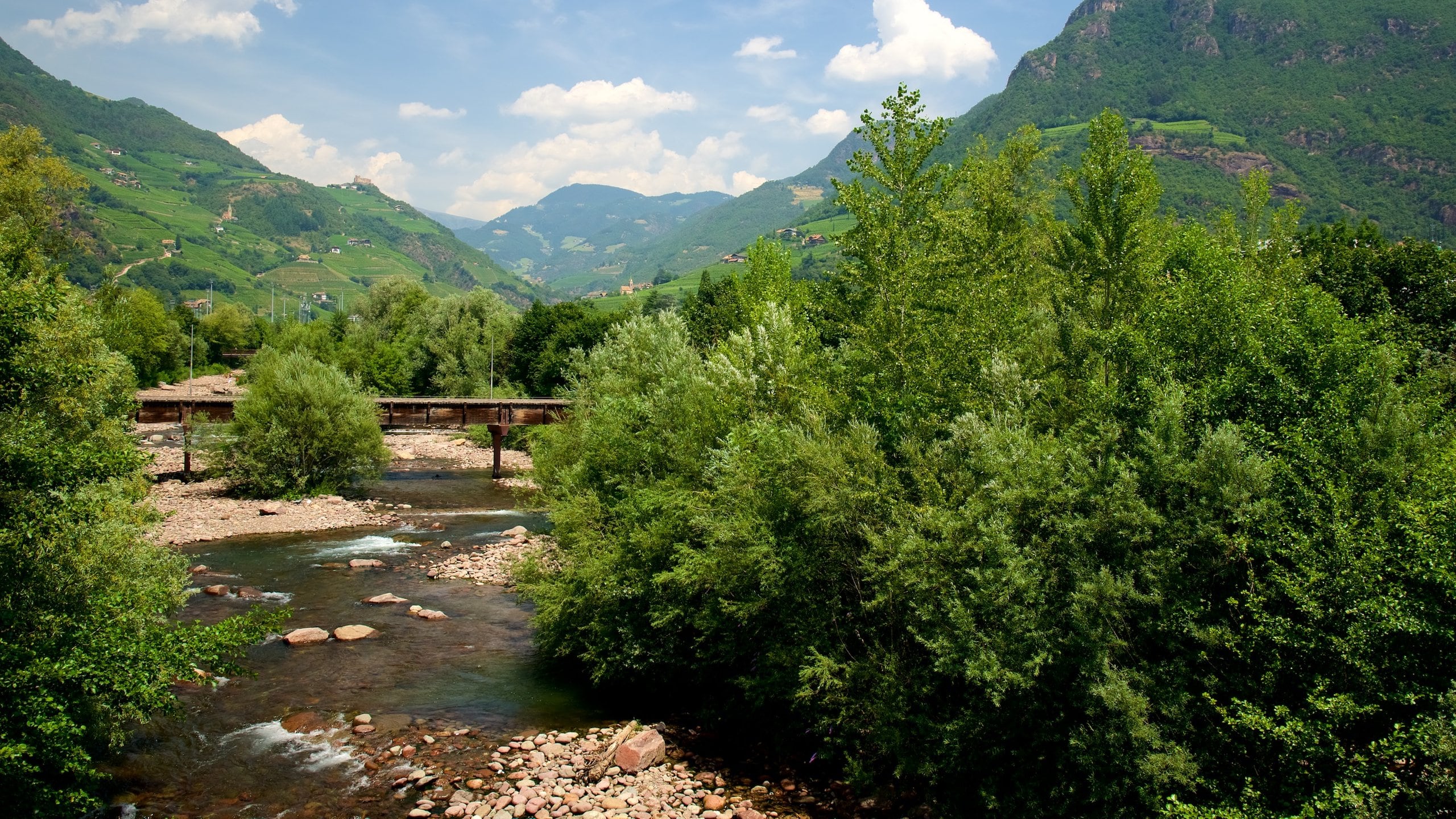 Bolzano featuring a river or creek and mountains