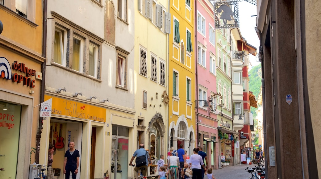 Bolzano showing street scenes as well as a family