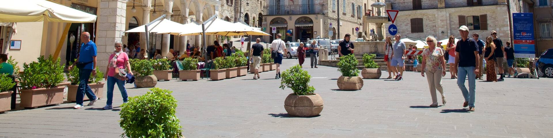 Piazza del Comune featuring café lifestyle, a city and heritage architecture
