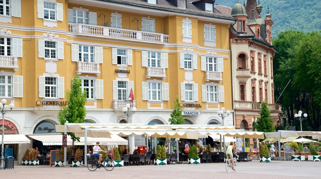 Piazza Walther featuring a city, a hotel and cycling