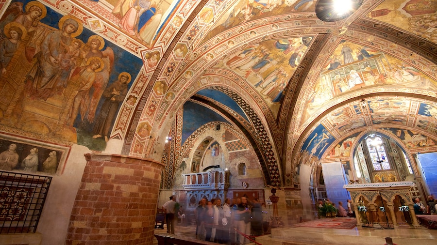 Papal Basilica of St. Francis of Assisi showing a church or cathedral, religious elements and interior views